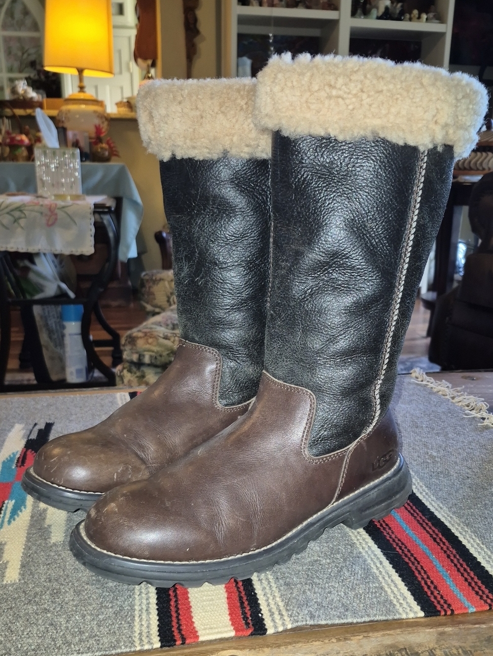 .UGG Brooks Tall model number 5490).VGC. Dark Brown Leather/sherling Insole